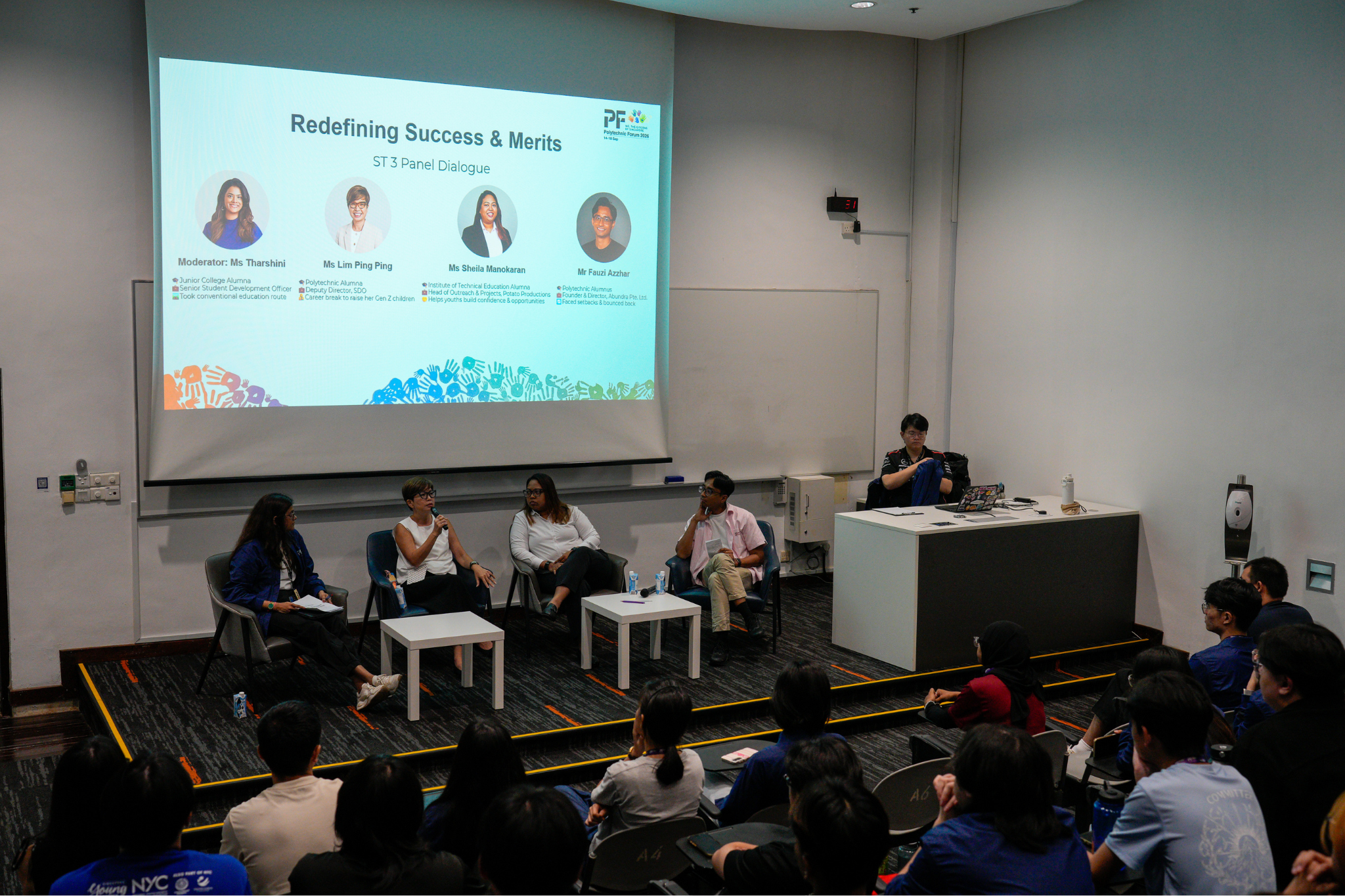 Student delegates participate in a panel dialogue exploring different definitions of success and achievement.